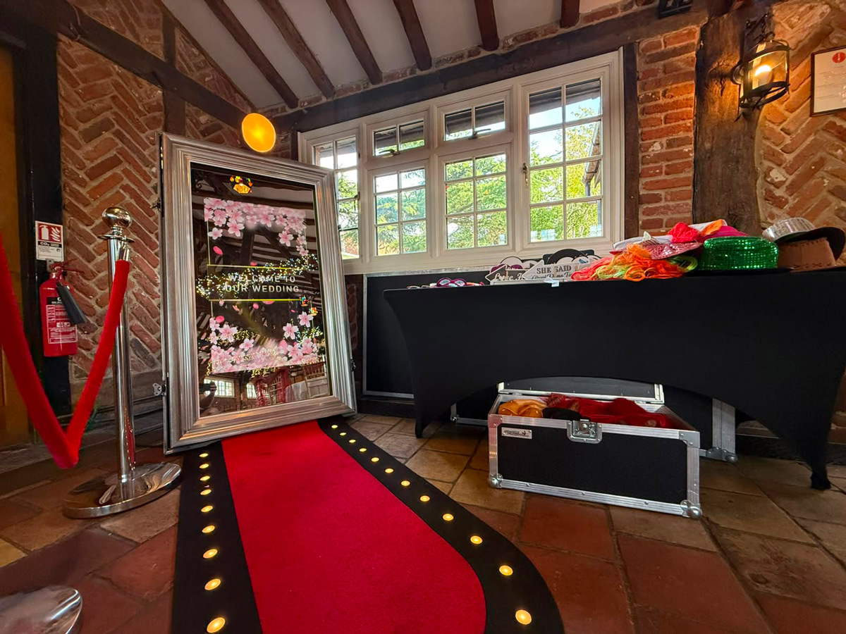 Magic Mirror photo booth hire Essex with red carpet and props for weddings